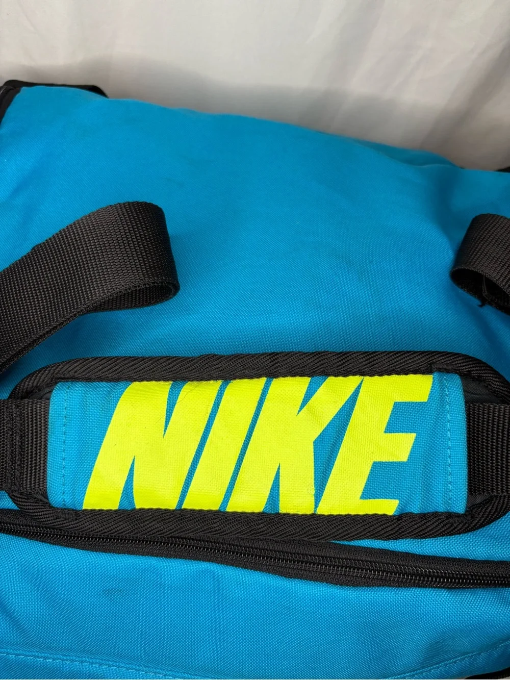Nike Men’s Blue & Neon Yellow Duffel Bag With Side Pockets and Shoulder Strap